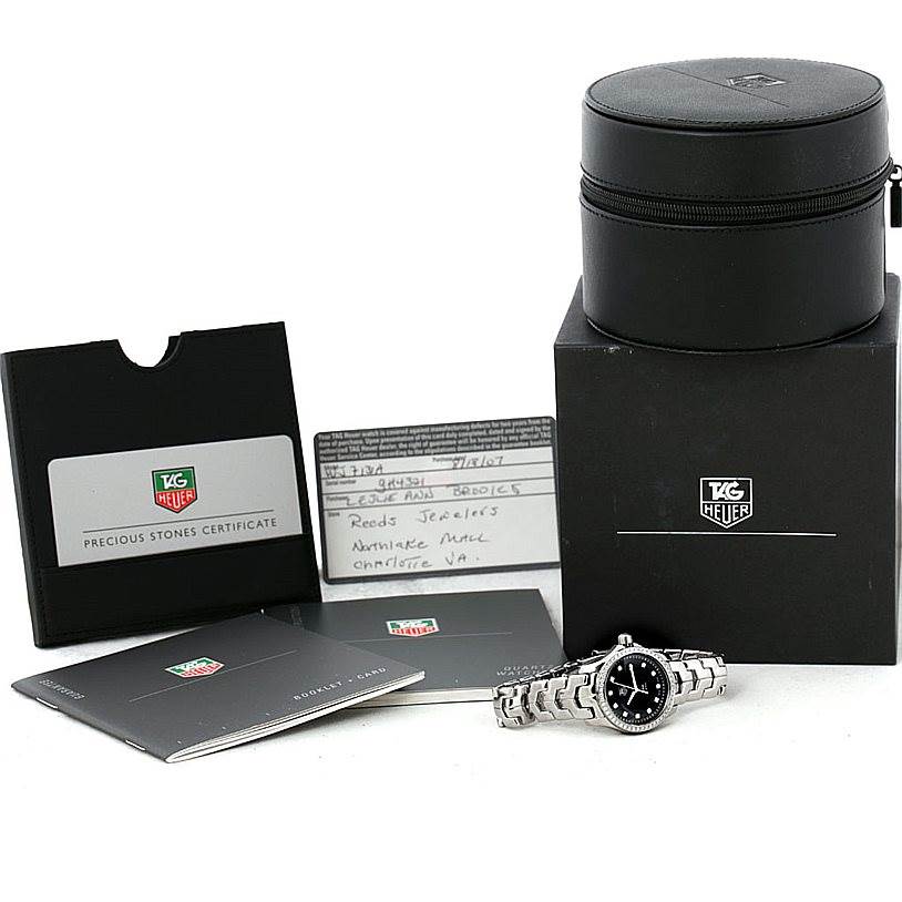 The image shows a Tag Heuer Link WJF131A Women's Stainless Steel Black Dial WJF131A Women's Stainless Steel Black Dial watch, its box, booklets, warranty card, and a round zippered case, all displayed from a front angle.