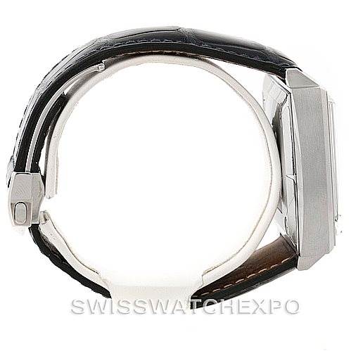 The image shows a side view of the Tag Heuer Monaco CW2113 Men's Stainless Steel Blue Dial CW2113 Men's Stainless Steel Blue Dial watch, highlighting the case, crown, clasp, and leather strap.