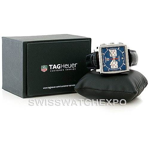 This image shows the Tag Heuer Monaco CW2113 Men's Stainless Steel Blue Dial CW2113 Men's Stainless Steel Blue Dial watch, presented at a slight angle to display both the dial and the strap, alongside its branded box.