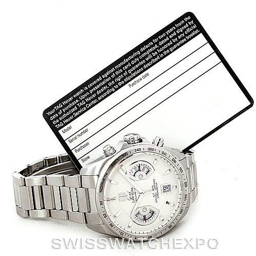The image shows a Tag Heuer Carrera CAV511B Men's Stainless Steel Silver Dial CAV511B Men's Stainless Steel Silver Dial watch laid flat with its bracelet extended and an accompanying authenticity card.