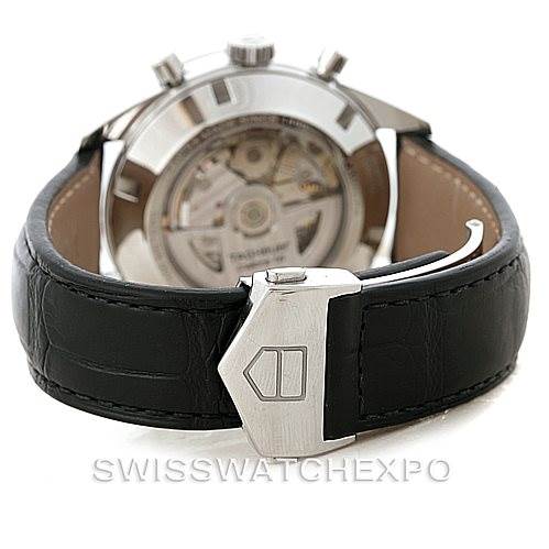 The image shows the back of a Tag Heuer Carrera CAS2110 Men's Stainless Steel Black Dial CAS2110 Men's Stainless Steel Black Dial watch, emphasizing its black leather strap and deployment clasp.