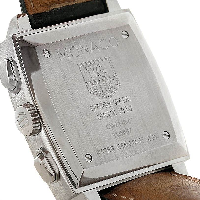 The image shows the back of a Tag Heuer Monaco CW2113 Men
s Stainless Steel Blue Dial CW2113 Men
s Stainless Steel Blue Dial watch, detailing the case, crown, and strap.