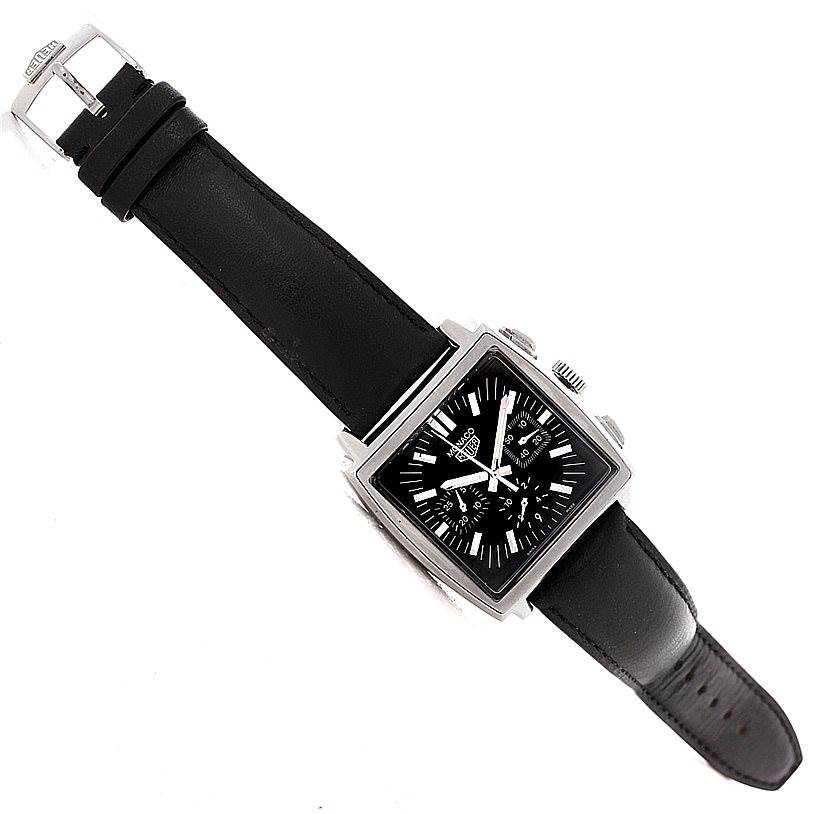 The Tag Heuer Monaco CS2111 Men's Stainless Steel Black Dial CS2111 Men's Stainless Steel Black Dial watch is shown from a top-down angle, displaying its square face and black leather strap.