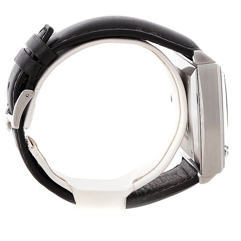 This image shows a side profile of the Tag Heuer Monaco CS2111 Men's Stainless Steel Black Dial CS2111 Men's Stainless Steel Black Dial watch with a visible buckle, strap, and metal casing.