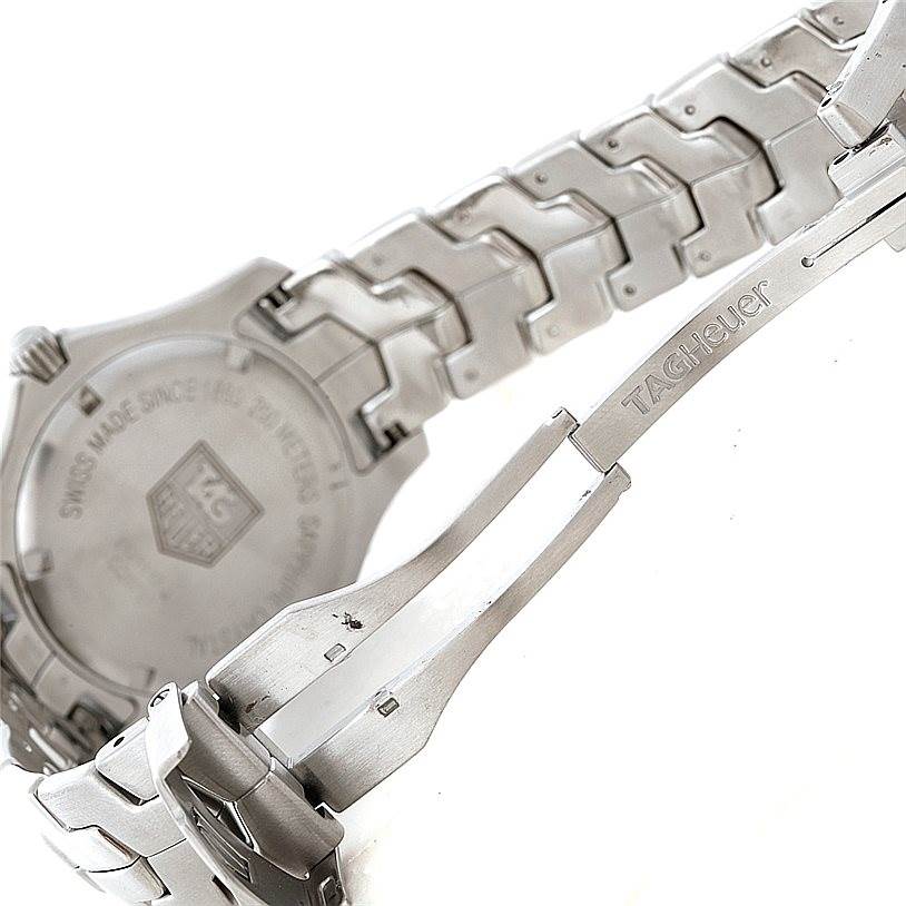 This image shows the back case and partially opened clasp of the Tag Heuer Link WJ1117 Men's Stainless Steel  WJ1117 Men's Stainless Steel  model watch.
