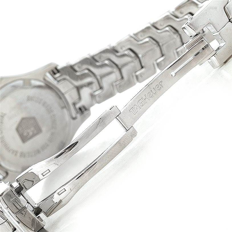 The image shows the clasp and part of the metal band of a Tag Heuer Link WJF1319 Women's Stainless Steel Mother of Pearl Dial WJF1319 Women's Stainless Steel Mother of Pearl Dial model watch.