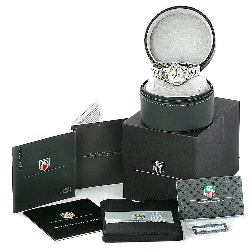 The Tag Heuer Link WJF1319 Women's Stainless Steel Mother of Pearl Dial WJF1319 Women's Stainless Steel Mother of Pearl Dial watch is displayed with its box, warranty card, instruction manual, and additional accessories.
