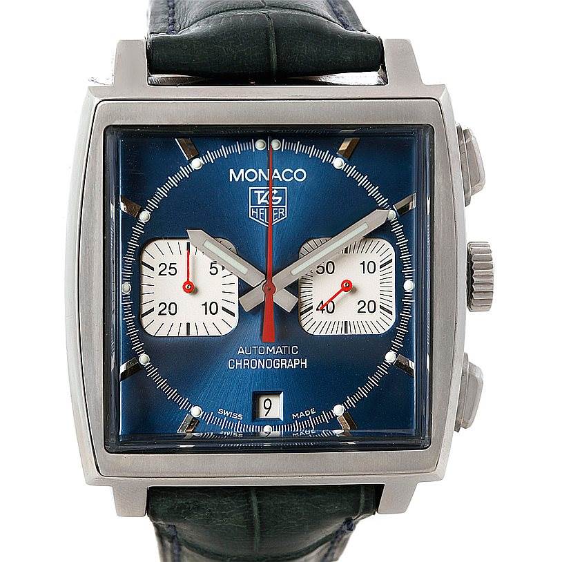 The image shows a front view of the Tag Heuer Monaco CW2113 Men's Stainless Steel Blue Dial CW2113 Men's Stainless Steel Blue Dial watch, highlighting its blue dial, chronograph sub-dials, and date display.