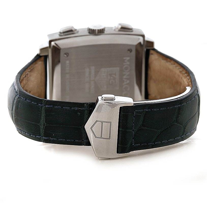 The image shows the back view of the Tag Heuer Monaco CW2113 Men's Stainless Steel Blue Dial CW2113 Men's Stainless Steel Blue Dial watch, focusing on the watch's case back and leather strap with a clasp.