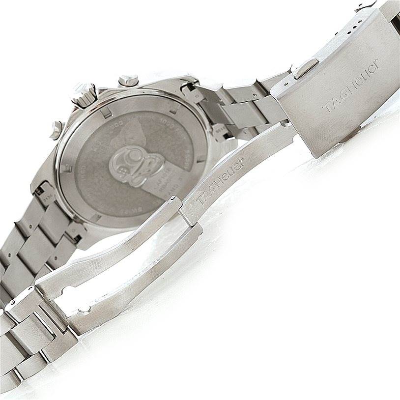 The image shows the backside view of the Tag Heuer Aquaracer CAF101B Men
s Stainless Steel Silver Dial CAF101B Men
s Stainless Steel Silver Dial watch, focusing on the case back and the open bracelet clasp.