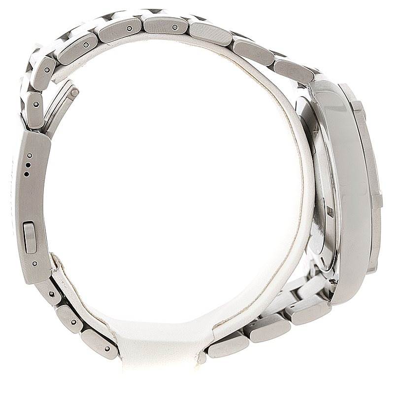 The image shows a side profile of the Tag Heuer Aquaracer CAF101B Men
s Stainless Steel Silver Dial CAF101B Men
s Stainless Steel Silver Dial watch, highlighting its metal bracelet and clasp.