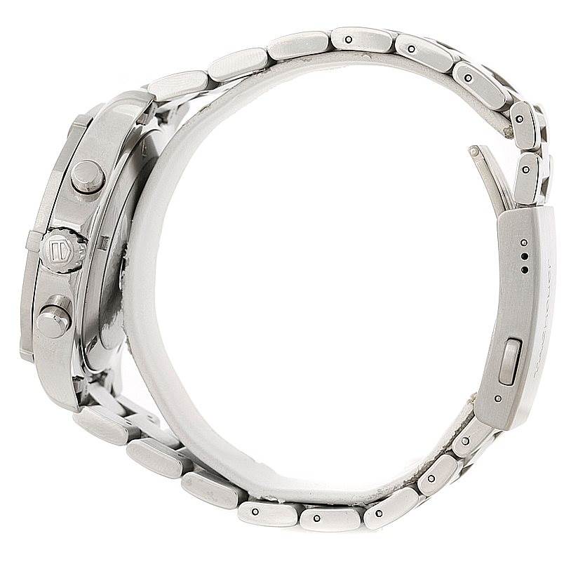 The image shows a side view of the Tag Heuer Aquaracer CAF101B Men
s Stainless Steel Silver Dial CAF101B Men
s Stainless Steel Silver Dial watch highlighting the crown, pushers, and metal bracelet.