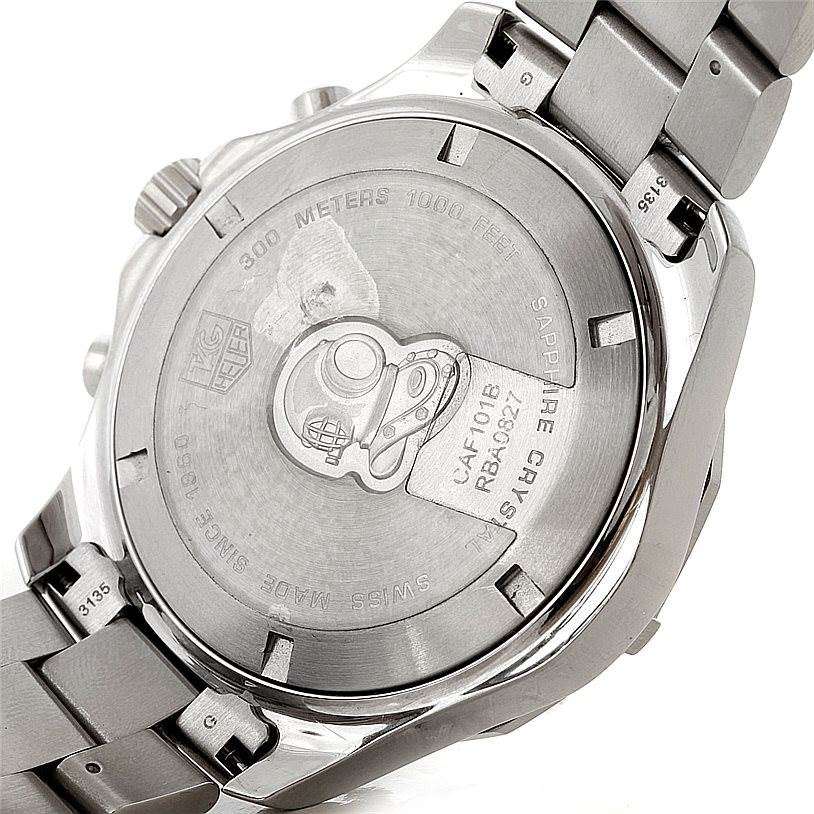 The image shows the back view of a Tag Heuer Aquaracer CAF101B Men
s Stainless Steel Silver Dial CAF101B Men
s Stainless Steel Silver Dial watch, highlighting its case back, engraving, and part of the bracelet.