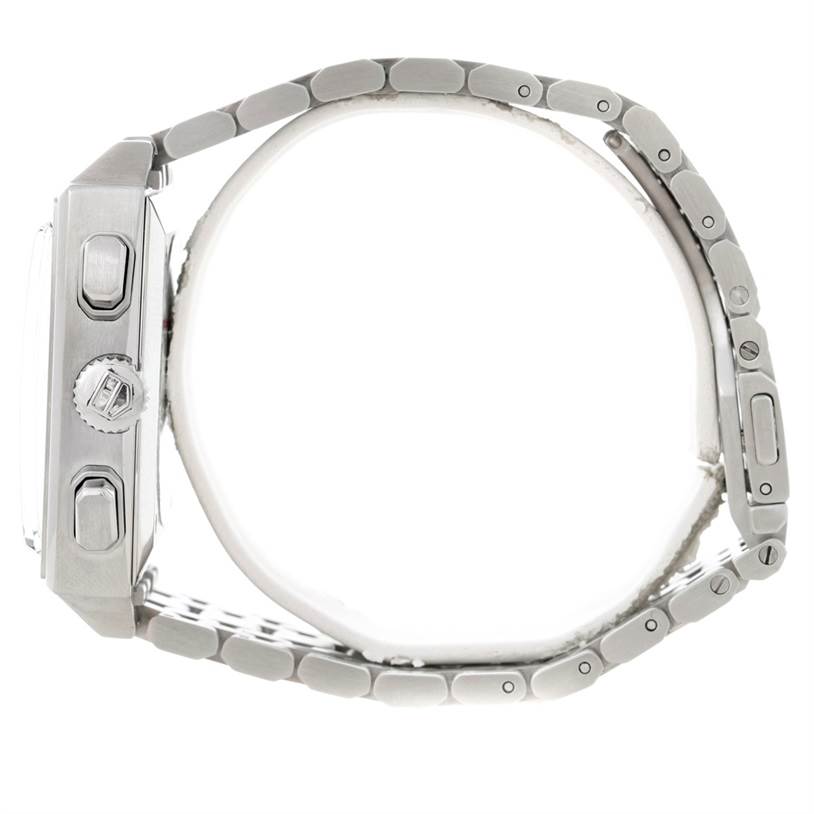 The image shows a side view of the Tag Heuer Monaco CW2113 Men's Stainless Steel Blue Dial CW2113 Men's Stainless Steel Blue Dial watch, highlighting the crown, pushers, and stainless steel bracelet.