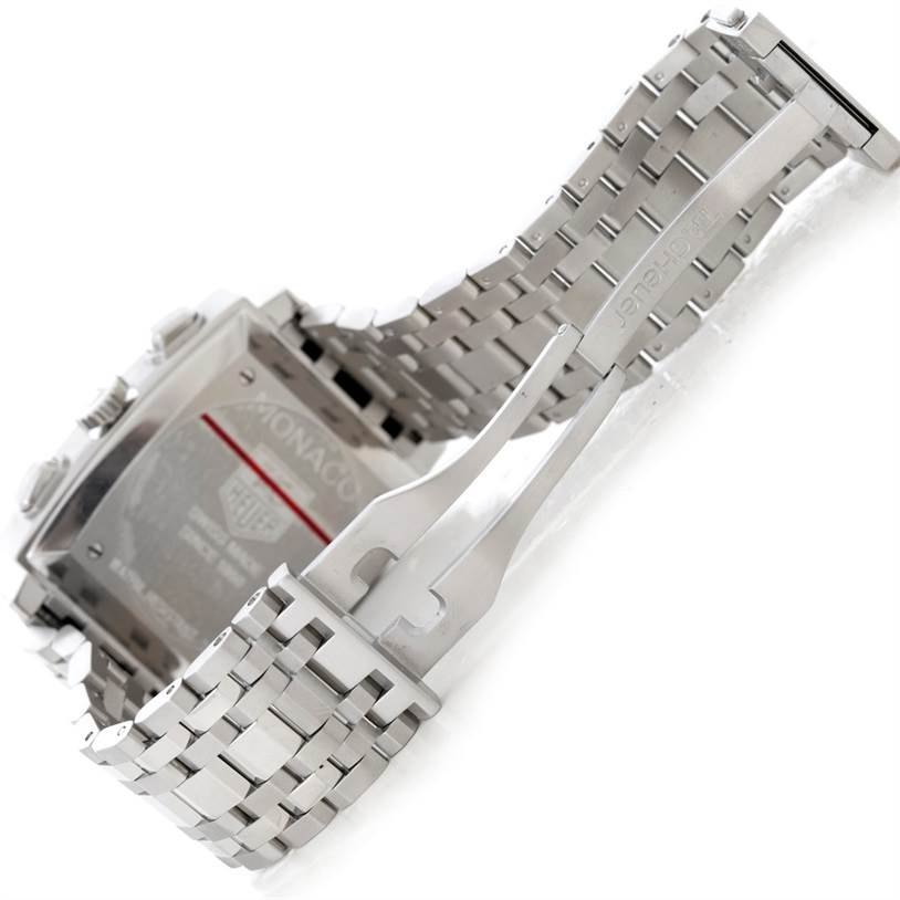 This image shows the backside and clasp of a Tag Heuer Monaco CW2113 Men's Stainless Steel Blue Dial CW2113 Men's Stainless Steel Blue Dial watch, highlighting the metal bracelet and folding clasp.