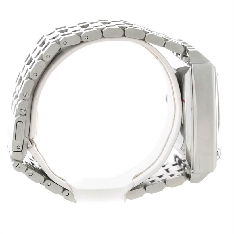 The image shows a side profile of a Tag Heuer Monaco CW2113 Men's Stainless Steel Blue Dial CW2113 Men's Stainless Steel Blue Dial watch, highlighting the stainless steel bracelet and case.