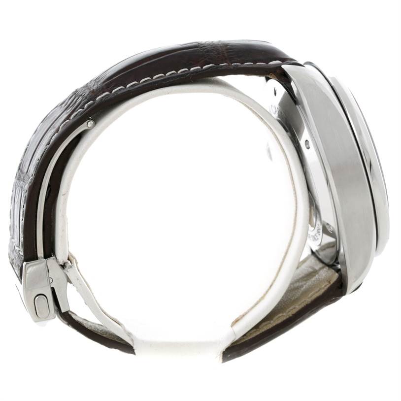 The image shows a side view of a Tag Heuer Carrera CAV511A.FC6225 Men
s Stainless Steel Black Dial CAV511A.FC6225 Men
s Stainless Steel Black Dial watch, highlighting its leather strap and stainless steel case.