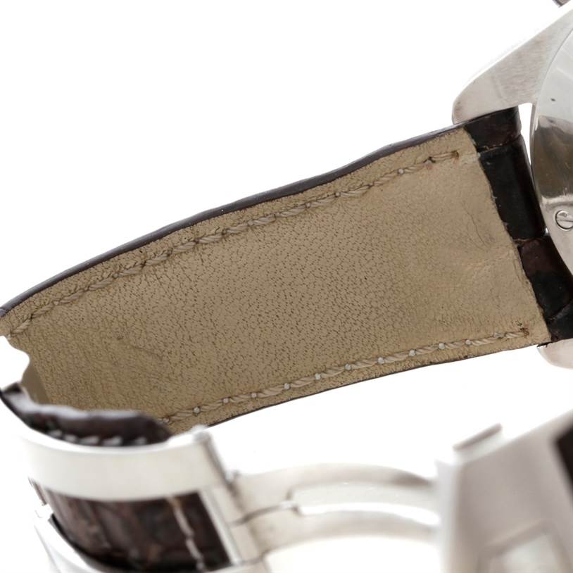 The image shows a close-up of the leather strap and metal clasp of a Tag Heuer Carrera CAV511A.FC6225 Men
s Stainless Steel Black Dial CAV511A.FC6225 Men
s Stainless Steel Black Dial watch.
