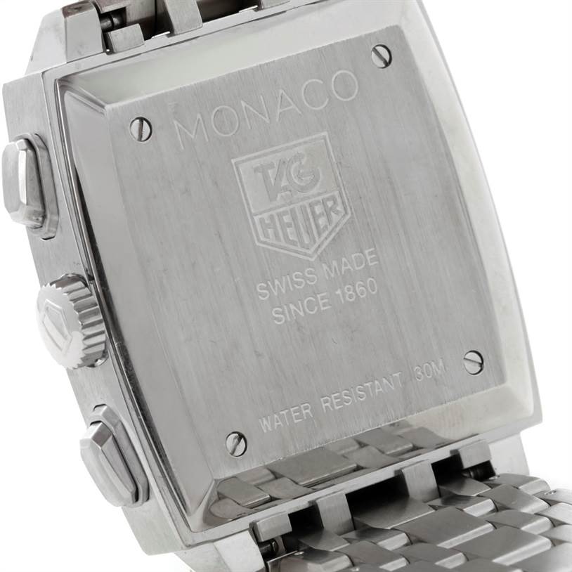 The image shows the back and side of the Tag Heuer Monaco CW2113 Men's Stainless Steel Blue Dial CW2113 Men's Stainless Steel Blue Dial watch, highlighting its case back, crown, and buttons.