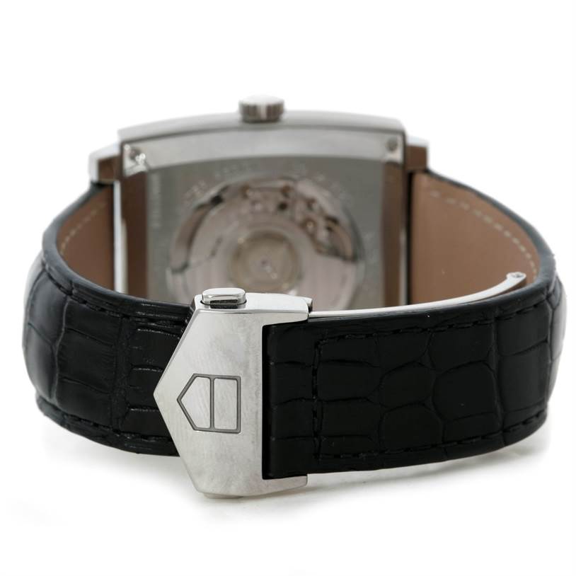 The image shows the back view of the Tag Heuer Monaco WW2110 Men's Stainless Steel Black Dial WW2110 Men's Stainless Steel Black Dial watch, focusing on the clasp, strap, and movement.