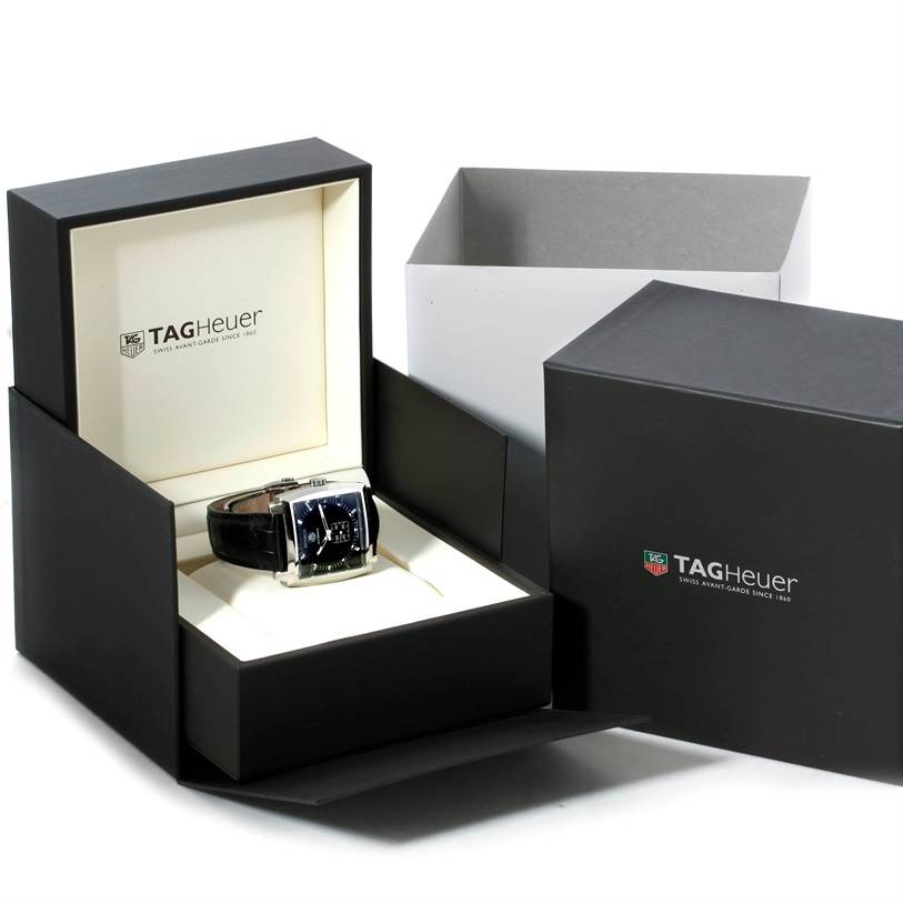 The Tag Heuer Monaco WW2110 Men's Stainless Steel Black Dial WW2110 Men's Stainless Steel Black Dial watch is displayed at an angle inside its branded packaging box.