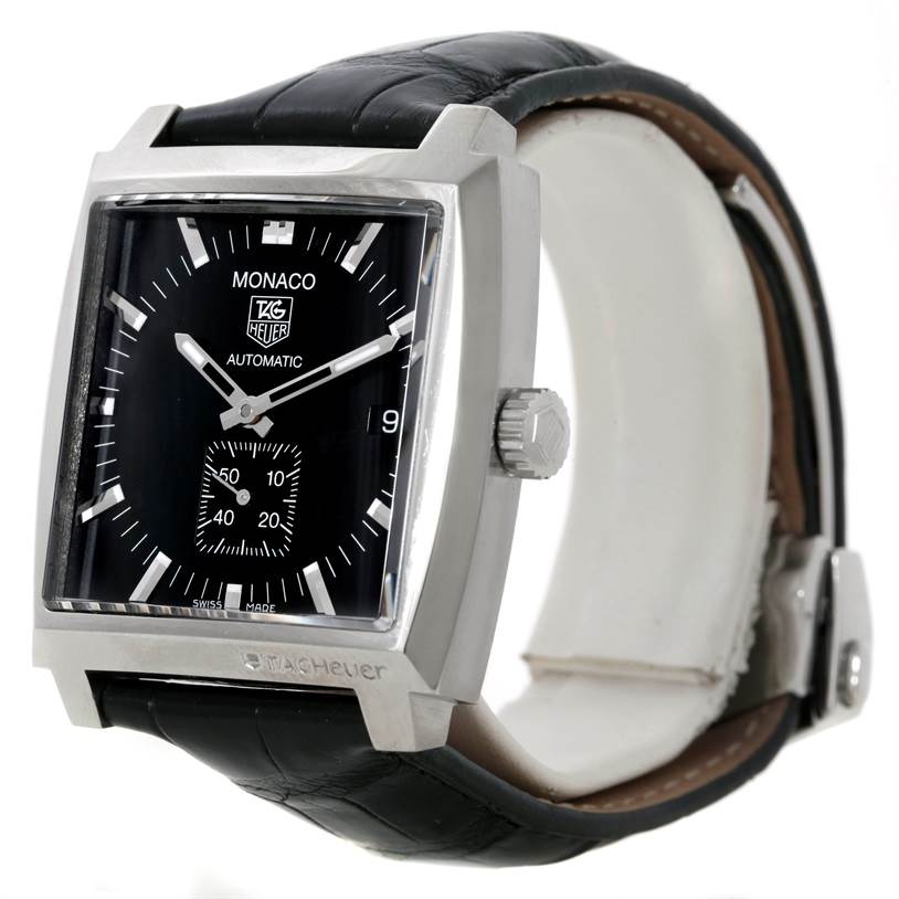 The image shows a Tag Heuer Monaco WW2110 Men's Stainless Steel Black Dial WW2110 Men's Stainless Steel Black Dial watch angled to display its face, bezel, crown, and black leather strap.