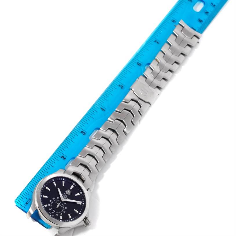 The image shows a Tag Heuer Link WJF211A Men's Stainless Steel Black Dial WJF211A Men's Stainless Steel Black Dial model watch laid flat with its bracelet and a ruler for scale.