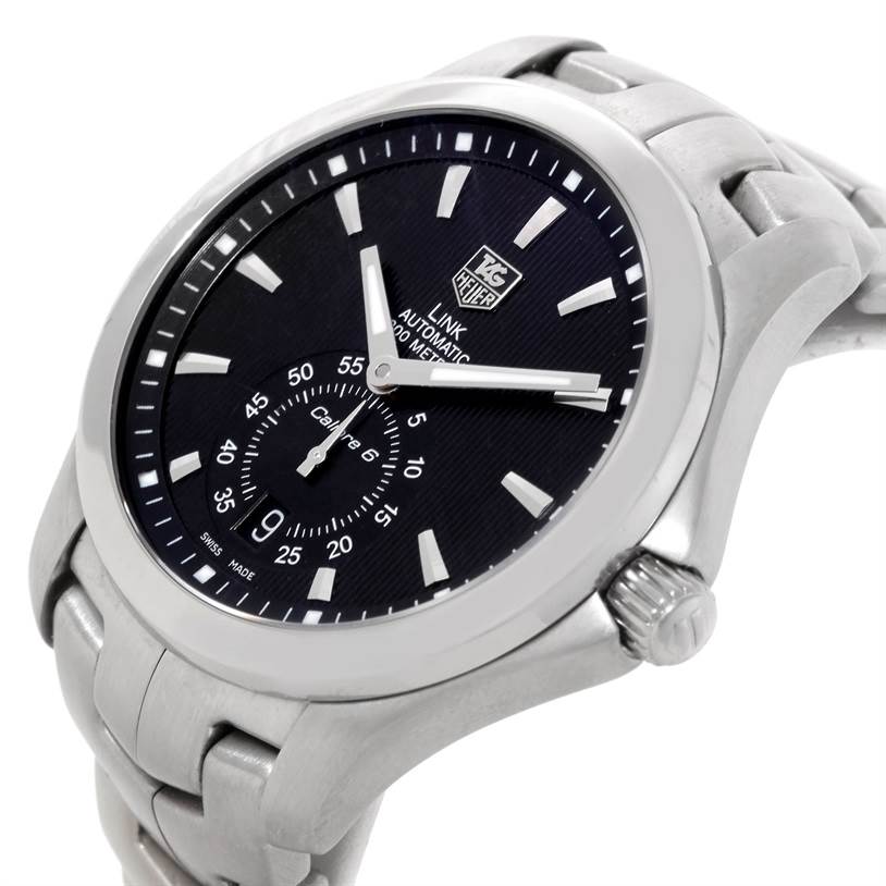 The image shows a close-up side view of the Tag Heuer Link WJF211A Men's Stainless Steel Black Dial WJF211A Men's Stainless Steel Black Dial model watch, displaying its face, case, and part of the bracelet.