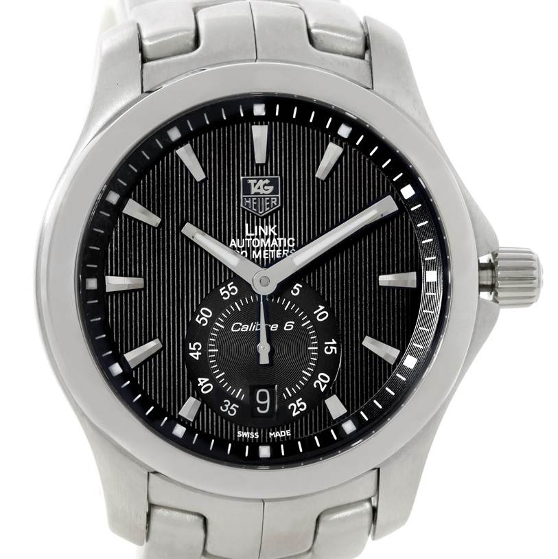 The image shows a front view of the Tag Heuer Link WJF211A Men's Stainless Steel Black Dial WJF211A Men's Stainless Steel Black Dial model watch, highlighting its black dial, hour markers, hands, and crown.