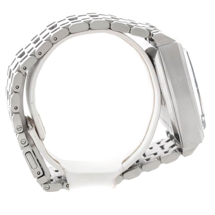 The image shows a side view of a Tag Heuer Monaco CW2113 Men's Stainless Steel Blue Dial CW2113 Men's Stainless Steel Blue Dial watch, featuring the bracelet and case profile.