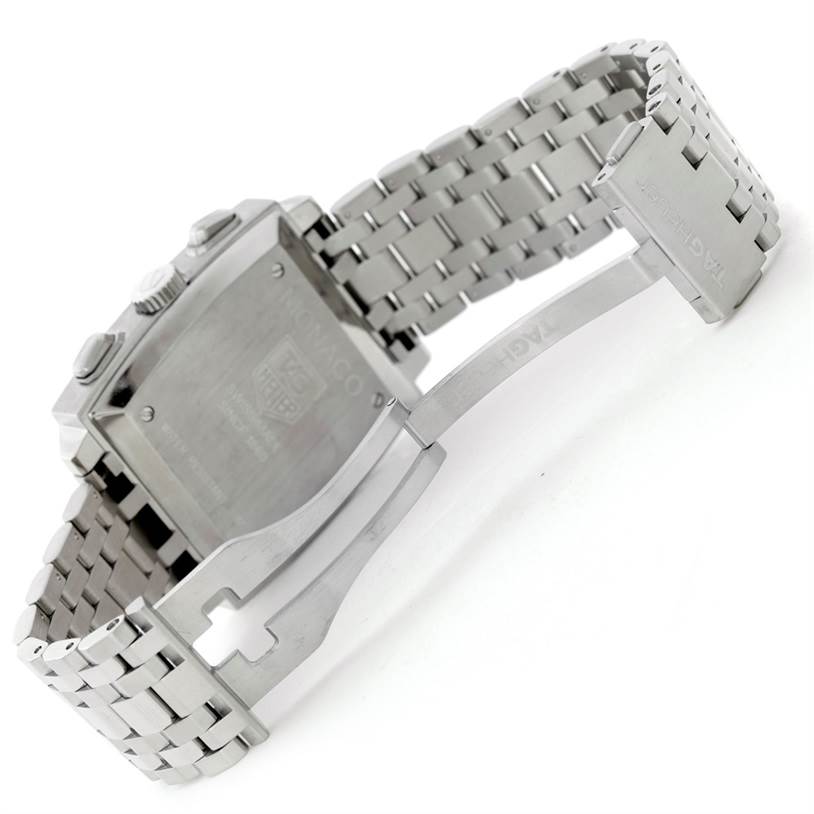 The image shows the back case and clasp of a Tag Heuer Monaco CW2113 Men's Stainless Steel Blue Dial CW2113 Men's Stainless Steel Blue Dial watch at an angle highlighting the bracelet.