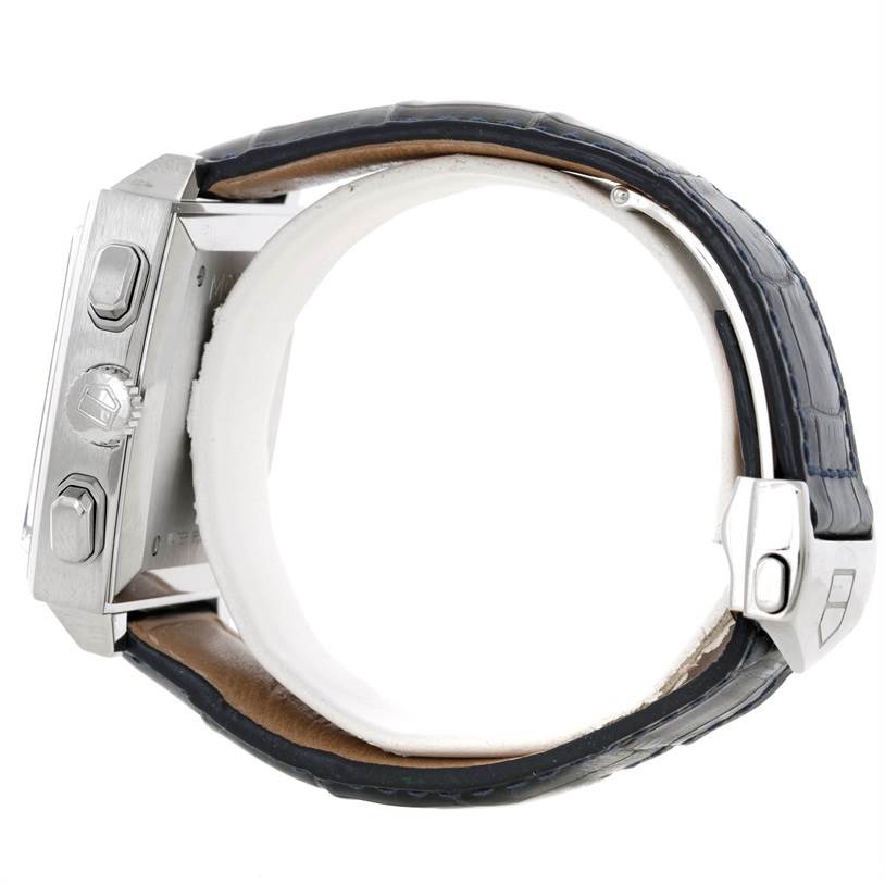 The image shows a side profile of a Tag Heuer Monaco CW2113 Men
s Stainless Steel Blue Dial CW2113 Men
s Stainless Steel Blue Dial watch, highlighting the case, crown, pushers, and leather strap.