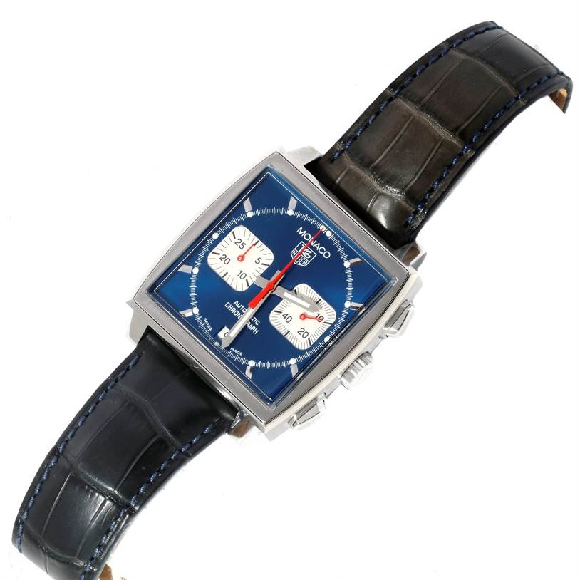The image shows a top-down view of a Tag Heuer Monaco CW2113 Men
s Stainless Steel Blue Dial CW2113 Men
s Stainless Steel Blue Dial watch with a square blue dial and a black leather strap.