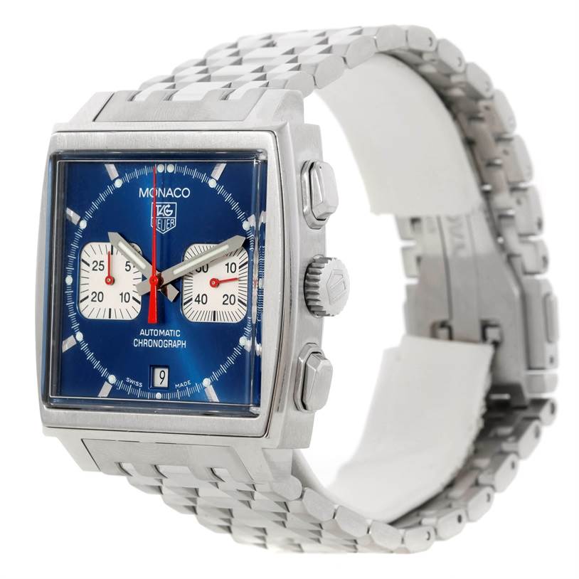 The image shows a Tag Heuer Monaco CW2113 Men's Stainless Steel Blue Dial CW2113 Men's Stainless Steel Blue Dial watch at a three-quarter angle, highlighting its case, dial, crown, pushers, and metal bracelet.
