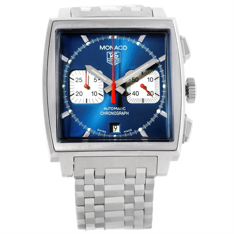 The image shows a Tag Heuer Monaco CW2113 Men's Stainless Steel Blue Dial CW2113 Men's Stainless Steel Blue Dial watch from a front angle, highlighting its blue dial, chronograph subdials, and metal bracelet.