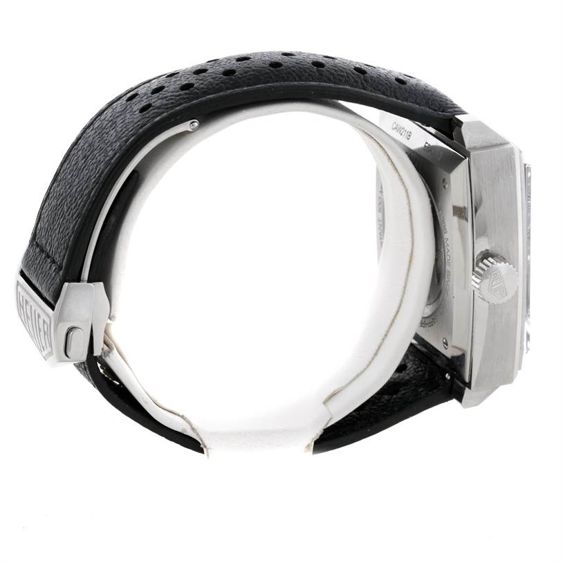 The side view of the Tag Heuer Limited Edition CAW211B Men's Stainless Steel Grey Dial CAW211B Men's Stainless Steel Grey Dial model shows the crown, case, and black leather strap with a TAG Heuer-branded clasp.