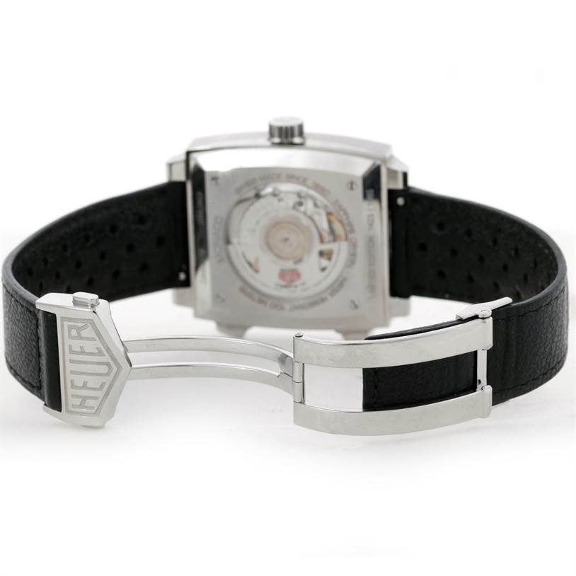 The image shows the backside and clasp of the Limited Edition Tag Heuer watch, highlighting its open caseback and leather strap.