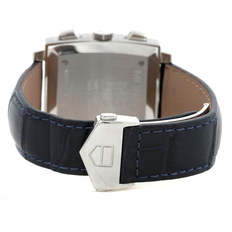 This image shows the back of the Tag Heuer Monaco CW2113 Men
s Stainless Steel Blue Dial CW2113 Men
s Stainless Steel Blue Dial watch and its leather strap with clasp.