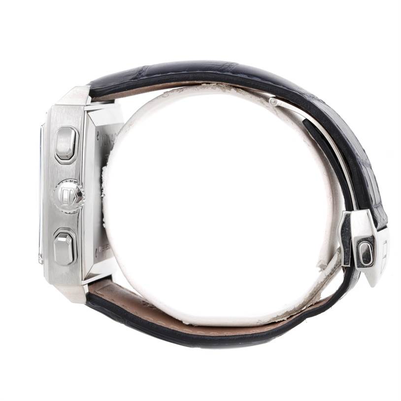 The image shows a side view of a Tag Heuer Monaco CW2113 Men
s Stainless Steel Blue Dial CW2113 Men
s Stainless Steel Blue Dial watch, highlighting the crown, pushers, and leather strap.