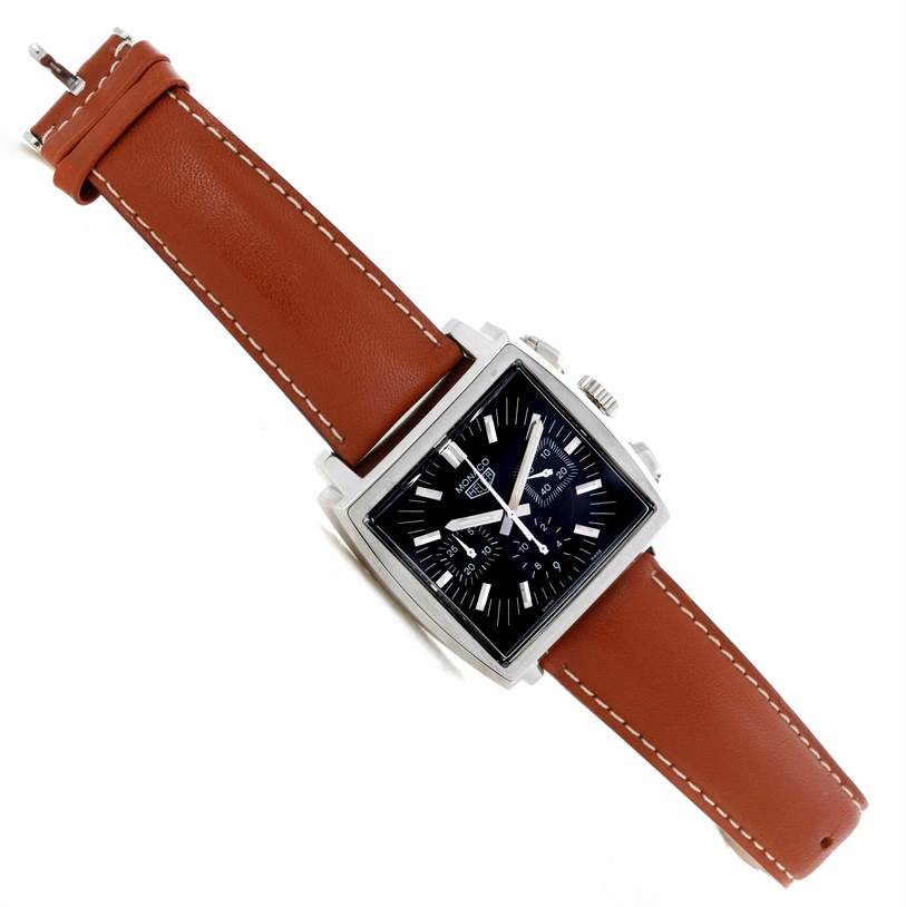 The Tag Heuer Monaco CS2111 Men's Stainless Steel Black Dial CS2111 Men's Stainless Steel Black Dial watch is shown at a slight angle displaying its square face, crown, and brown leather strap.