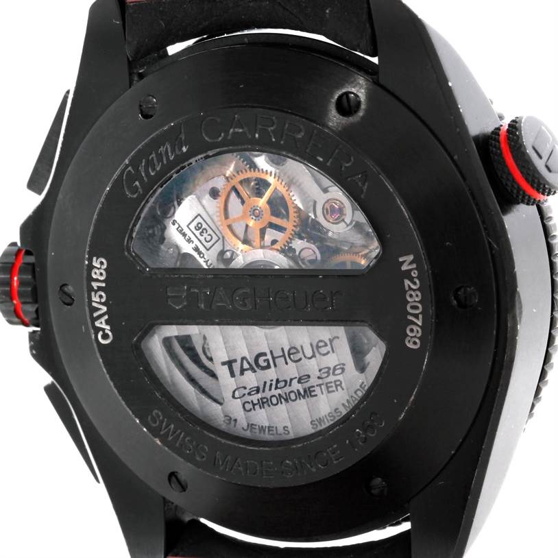 The image shows the back of a Tag Heuer Carrera CAV5185.FC6237 Men's Titanium Black Dial CAV5185.FC6237 Men's Titanium Black Dial watch, displaying its inner mechanics and engravings.