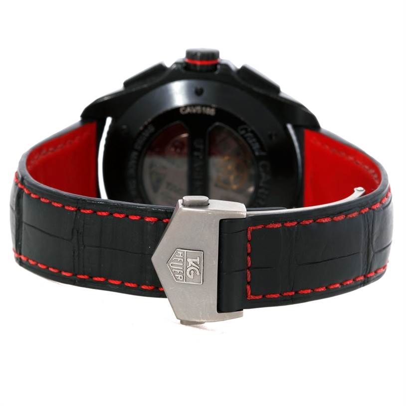 The image shows the back view of the Tag Heuer Carrera CAV5185.FC6237 Men's Titanium Black Dial CAV5185.FC6237 Men's Titanium Black Dial model watch, focusing on the leather strap with red stitching and the clasp.