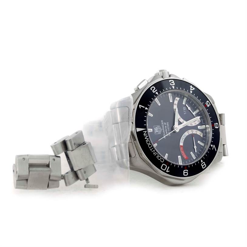 The image shows a Tag Heuer Aquaracer CAF7111.BA0803 Men's Stainless Steel Black Dial CAF7111.BA0803 Men's Stainless Steel Black Dial watch from a side angle with its bracelet detached and visible alongside it.