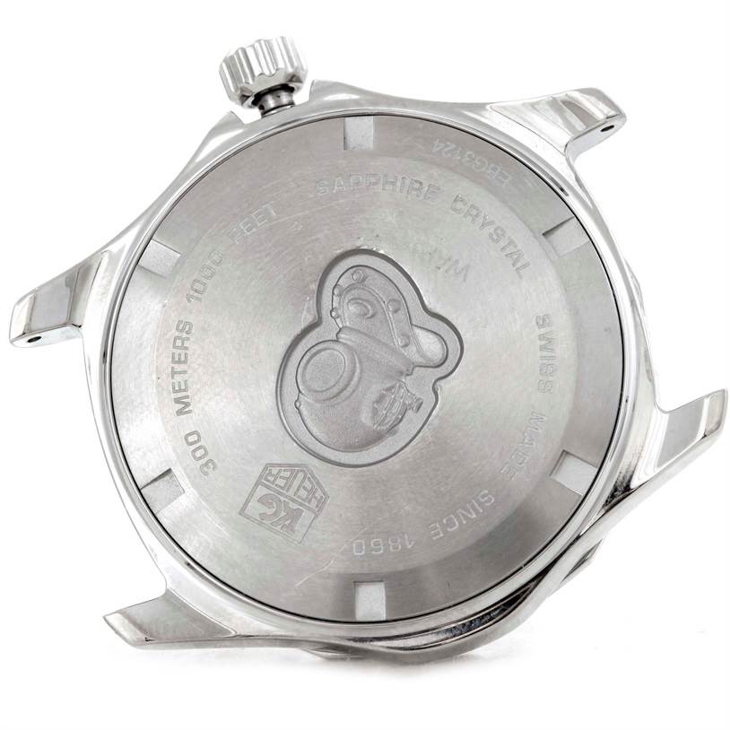 The image shows the back (case back) of a Tag Heuer Aquaracer WAP1112 Men's Stainless Steel Blue Dial WAP1112 Men's Stainless Steel Blue Dial watch, highlighting the engraved details and crown.