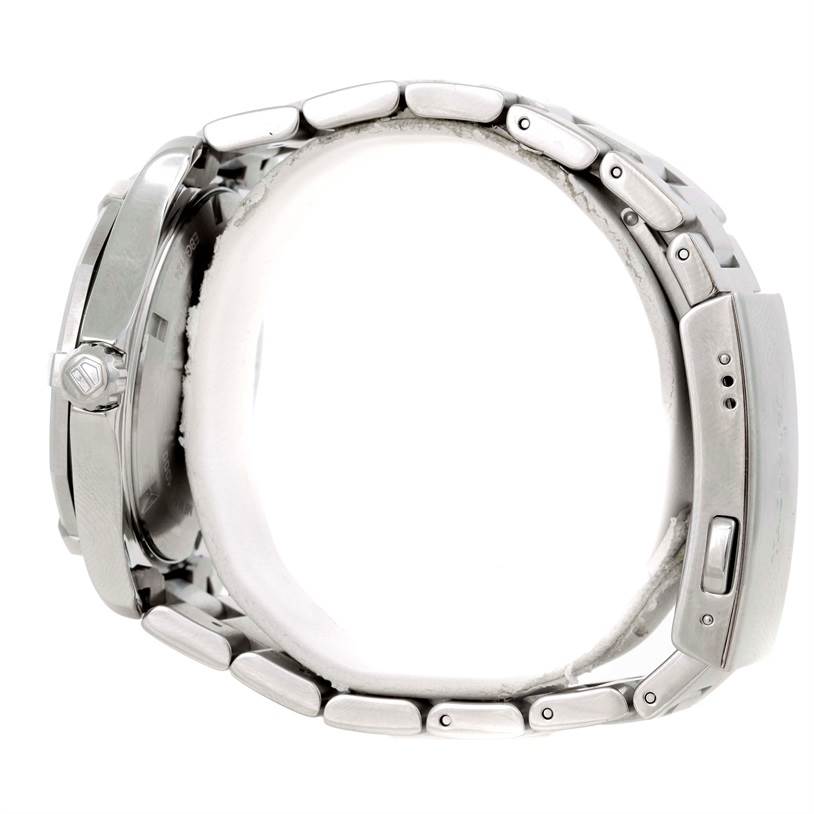 This side-angle view of the Tag Heuer Aquaracer WAP1112 Men's Stainless Steel Blue Dial WAP1112 Men's Stainless Steel Blue Dial watch showcases the bezel, crown, and stainless steel bracelet.