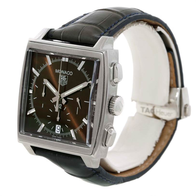 The image shows a side angle of a Tag Heuer Monaco CW2114 Men's Stainless Steel Brown Dial CW2114 Men's Stainless Steel Brown Dial watch, highlighting its dial, case, crown, pushers, and strap.