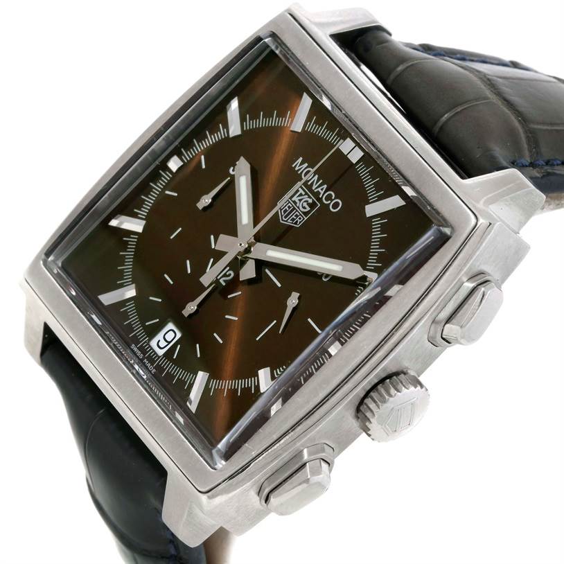 The image shows an angled view of a Tag Heuer Monaco CW2114 Men's Stainless Steel Brown Dial CW2114 Men's Stainless Steel Brown Dial watch displaying the dial, crown, and leather strap.