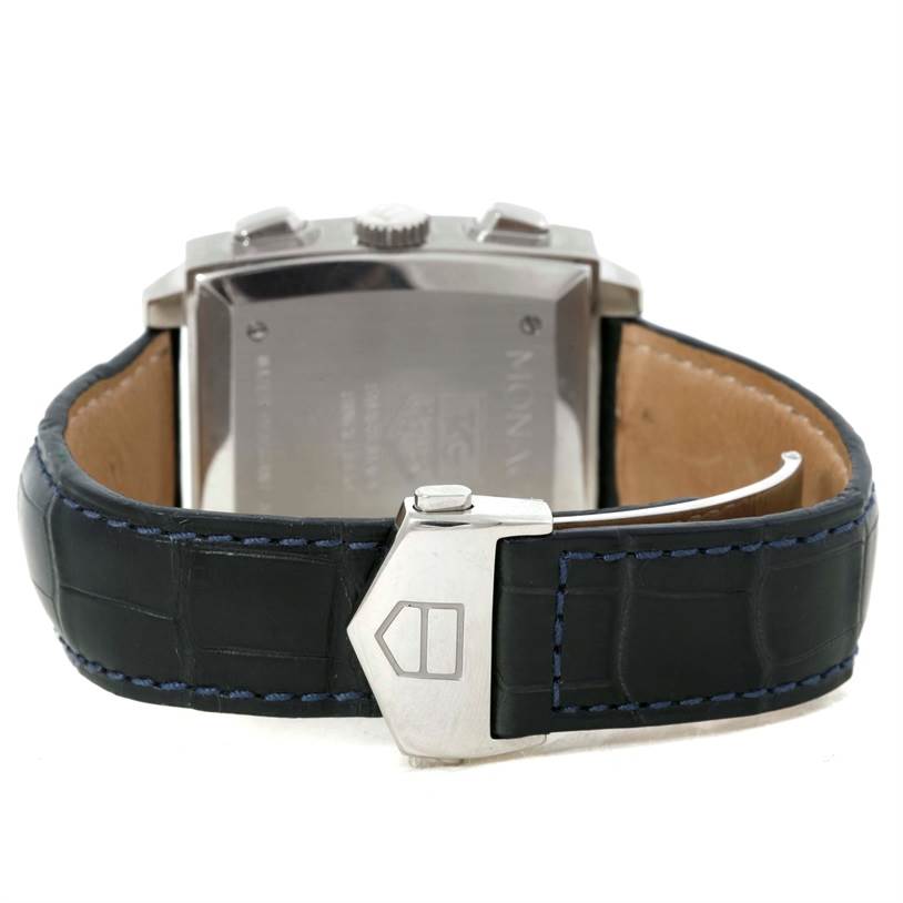 The image shows the back view of a Tag Heuer Monaco CW2114 Men's Stainless Steel Brown Dial CW2114 Men's Stainless Steel Brown Dial watch, highlighting the clasp and the leather strap with blue stitching.
