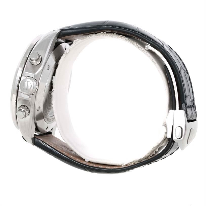 Side view of a Tag Heuer Carrera CAV511A.FC6225 Men's Stainless Steel Black Dial CAV511A.FC6225 Men's Stainless Steel Black Dial watch showing its crown, pushers, and black leather strap.