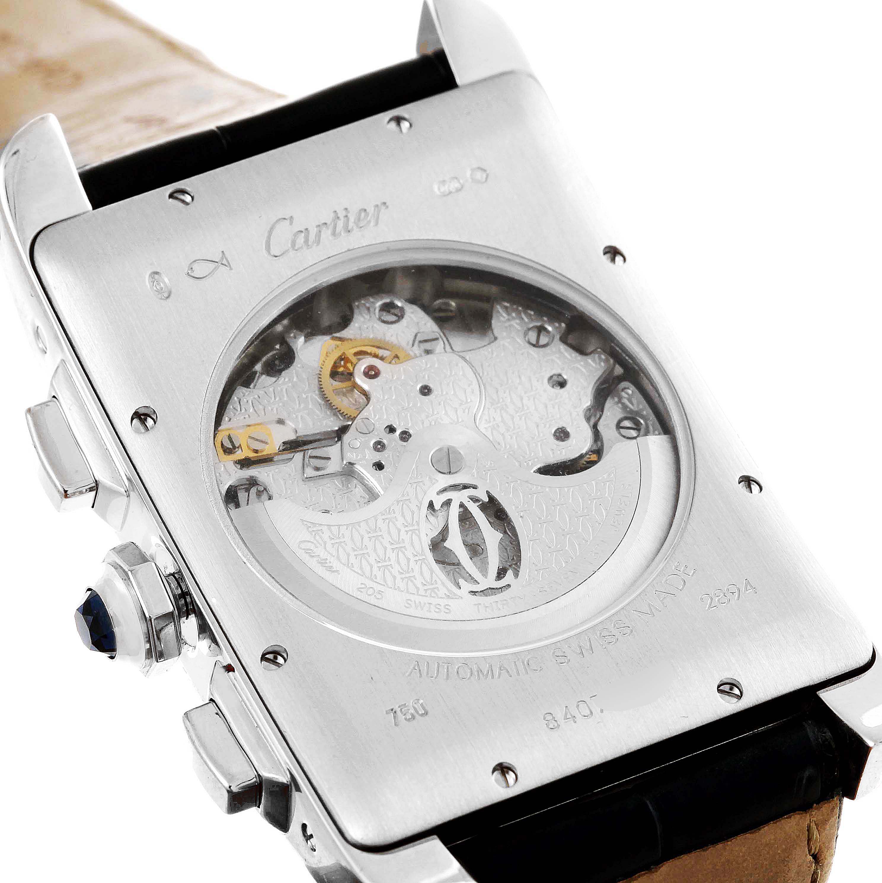 The image shows the back view of the Cartier Tank Americaine W2609456 Men's White Gold Silver Dial W2609456 Men's White Gold Silver Dial watch, displaying its intricate internal mechanism and movement.